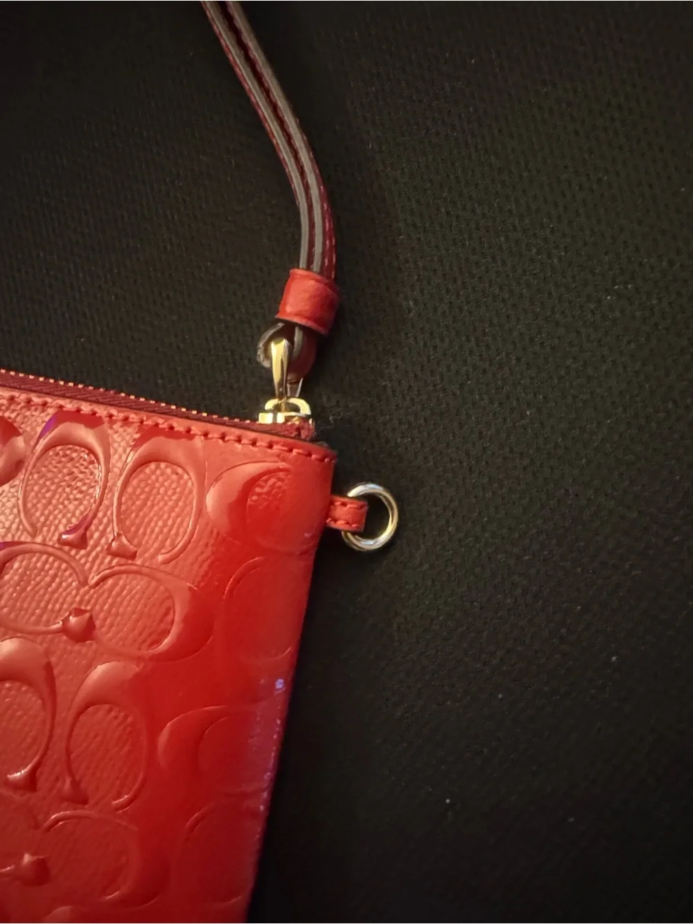 COACH Red Embossed Signature Wristlet with Gold Logo